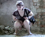 Girl peeing down her own drain