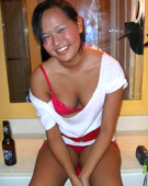 Asian opens her tight shaved pussy