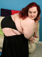 Young freckle faced coed plumper