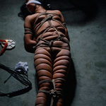 Slave forced to wash the floor while tied...does she slow down on purpose to deserve her whipping? only she knows!