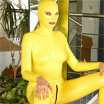 Princess in latex gets fucked by two guys in rubber