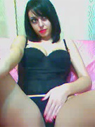 Brunette beauty on cam with dildo between her tits