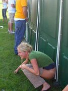 Babes pissing on a skinny guy