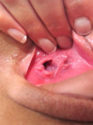 Teen slips a plug in her ass and orgasms