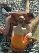Beach lady with nice tits fucked among the waves